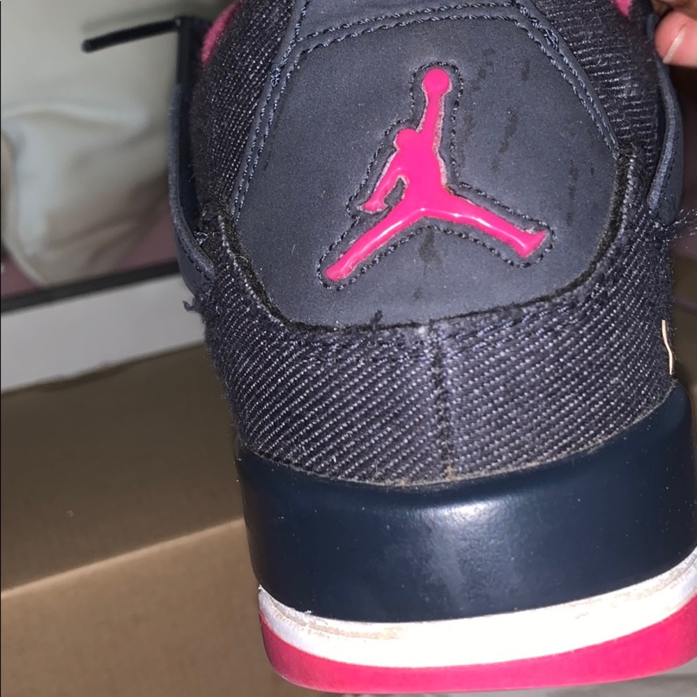 Navy blue and pink Jordan 4s